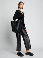 Image of model carrying Sullivan Leather Bag in BLACK on shoulder
