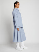 Side full length image of model wearing Faux Suede Shirt in STONE BLUE