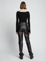 Back full length image of model wearing Leather Straight Pant in BLACK