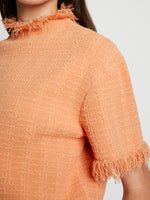 Detail image of model wearing Viscose Jacquard Top in CORAL