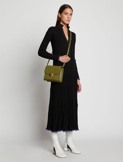 Image of model carrying Dia Day Bag in moss