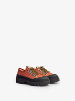 Front 3/4 image of City Lug Sole Shoes in dark orange