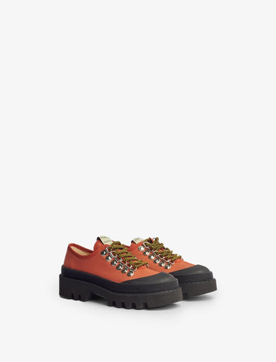 Front 3/4 image of City Lug Sole Shoes in dark orange