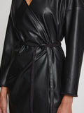 Detail image of model wearing Faux Leather Wrap Dress in BLACK