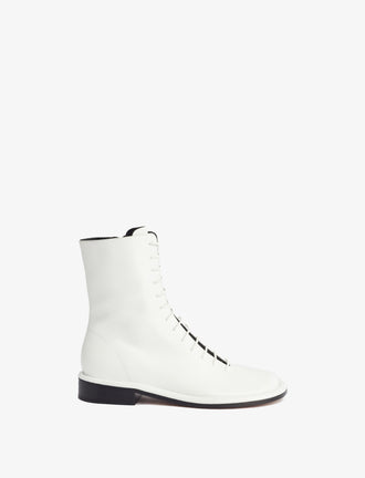 Front image of Pipe Lace Up Boots in White.jpg