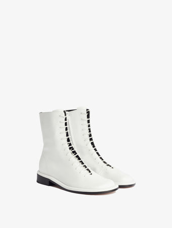 3/4 Front image of Pipe Lace Up Boots in White.jpg