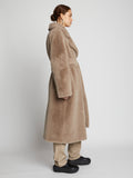 Front full length image of model wearing Faux Fur Belted Coat in TAUPE