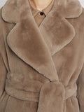 Back full length image of model wearing Faux Fur Belted Coat in TAUPE
