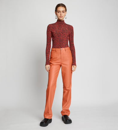 Front full length image of model wearing Leather Straight Pants in TERRACOTTA