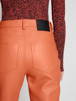 Detail image of model wearing Leather Straight Pants in TERRACOTTA