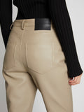 Detail image of model wearing Leather Straight Pants in TAUPE