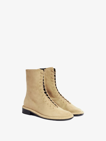3/4 Front image of Pipe Lace Up Boots in Cream.jpg