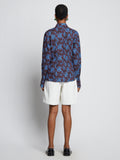 Back image of model wearing Sunflower Poplin Shirt in sky blue/wine