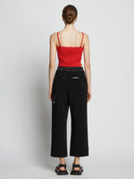 Back full length image of model wearing Cotton Cashmere Tank Top in POPPY