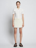 Front full length image of model wearing Tweed Mini Skirt in OFF WHITE