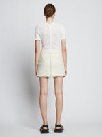 Back full length image of model wearing Tweed Mini Skirt in OFF WHITE