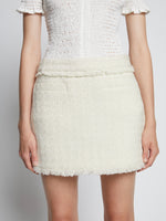 Detail image of model wearing Tweed Mini Skirt in OFF WHITE