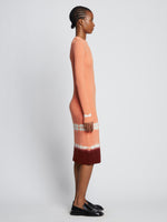 Side full length image of model wearing Rib Knit Dip Dye Dress in SALMON MULTI
