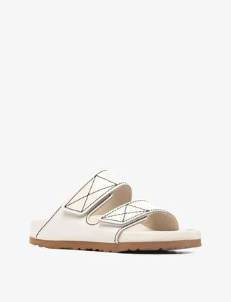Proenza Schouler front 3/4 image of Arizona PS EXQ Berlin Birkenstock collaboration in Ecru 