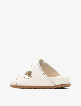 Proenza Schouler back 3/4 image of Arizona PS EXQ Berlin Birkenstock collaboration in Ecru 