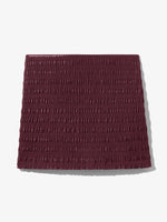 Still Life image of Faux Leather Smocked Mini Skirt in PLUM