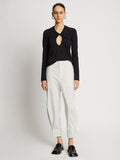 Front full length image of model wearing Cotton Twill Tapered Pants in OFF WHITE