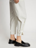 Detail image of model wearing Cotton Twill Tapered Pants in OFF WHITE