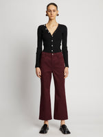 Front full length image of model wearing Cotton Twill Cropped Pants in PLUM