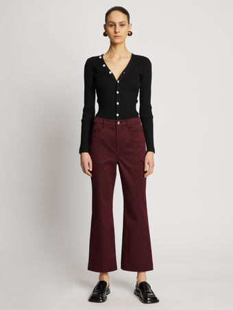 Front full length image of model wearing Cotton Twill Cropped Pants in PLUM