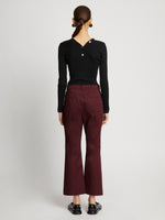 Back full length image of model wearing Cotton Twill Cropped Pants in PLUM