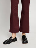 Detail image of model wearing Cotton Twill Cropped Pants in PLUM