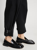 Detail image of model wearing Cotton Twill Tapered Pants in BLACKDetail image of model wearing Cotton Twill Tapered Pants in BLACK