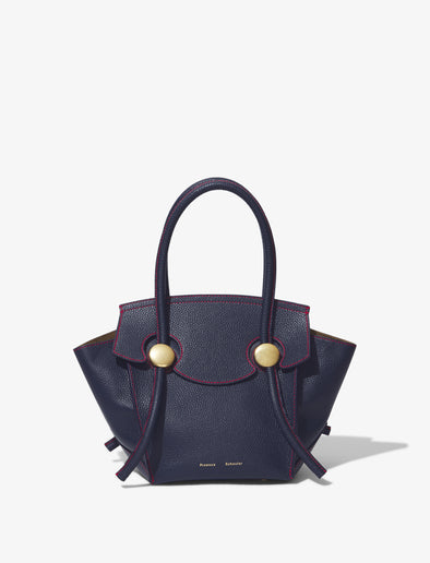 Front image of Small Grainy Leather Pipe Bag in navy/red