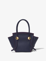 Back image of Small Grainy Leather Pipe Bag in navy/red