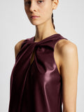 Detail image of model wearing Faux Leather Sleeveless Dress in PLUM