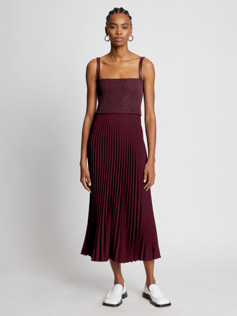 Front full length image of model wearing Bi-Color Pleated Dress in PLUM