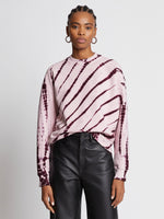 Front cropped image of model wearing Tie Dye Sweatshirt in LIGHT PINK/PLUM