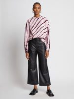 Front full length image of model wearing Tie Dye Sweatshirt in LIGHT PINK/PLUM