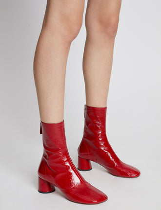Image of model wearing Patent Glove Boots in Red