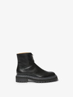Side image of Lug Sole Zip Boots in Black
