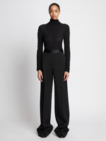 Front full length image of model wearing Wool Twill Satin Trim Pants in BLACK