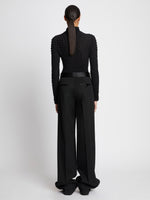 Back full length image of model wearing Wool Twill Satin Trim Pants in BLACK