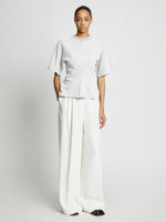 Front full length image of model wearing Eco Cotton Waisted T-Shirt in WHITE