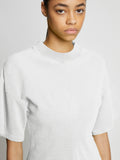Detail image of model wearing Eco Cotton Waisted T-Shirt in WHITE