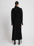 Back full length image of model wearing Pleated Matte Jersey Shirt Dress in BLACK