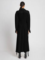 Back full length image of model wearing Pleated Matte Jersey Shirt Dress in BLACK