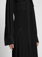 Detail image of model wearing Pleated Matte Jersey Shirt Dress in BLACK