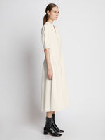 Side full length image of model wearing Cotton Viscose Zip Front Dress in ECRU