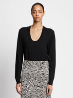Front cropped image of model wearing Eco Superfine Merino Scoop Neck Sweater in BLACK