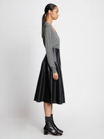 Side full length image of model wearing Eco Superfine Merino Scoop Neck Sweater
 in GREY MELANGE